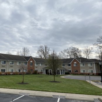 parking lot view of The Crossings building